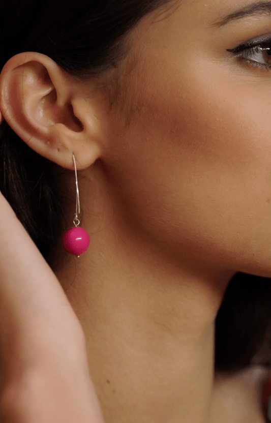 pearl ball drop earrings| faux pearl earrings| pearls on sterling silver hooks| hot pink pearl earrings| summer earring colours| liv rian model actress wearing Miami Spice earrings in hot pink